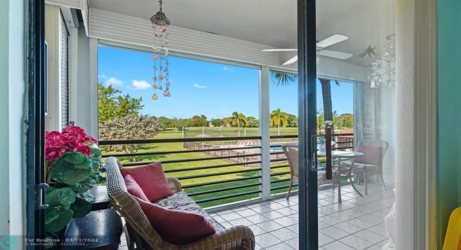 Master bedroom view of the pool and golf course
