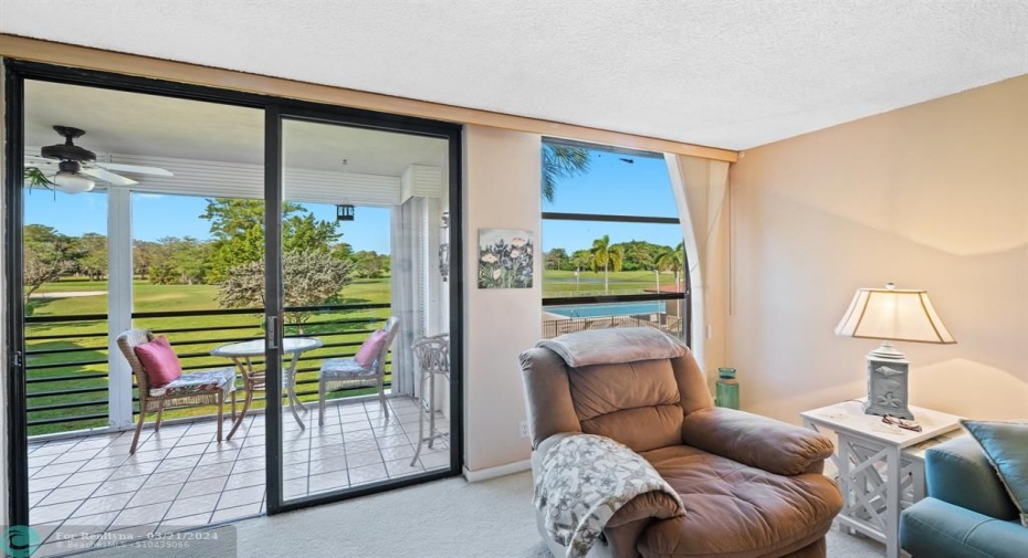 Living room with golf course view