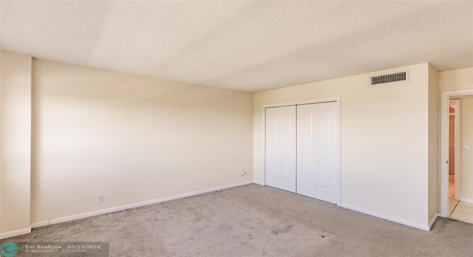Double closets in secondary bedroom