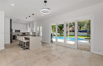 VIEW TO THE KITCHEN AND POOL