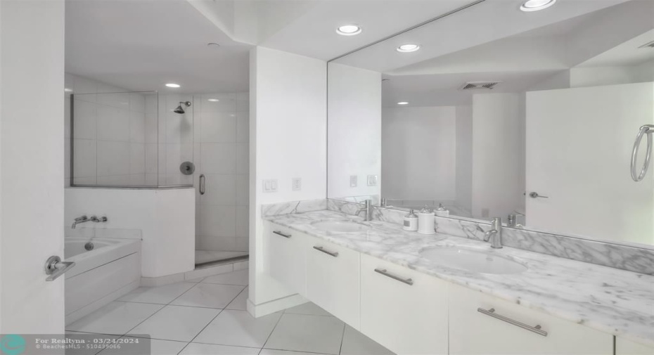 Master Bath has dualvanity, Standing Showerand soaker tub.