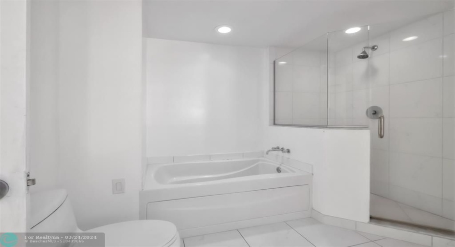 Master Bath has dualvanity, Standing Showerand soaker tub.