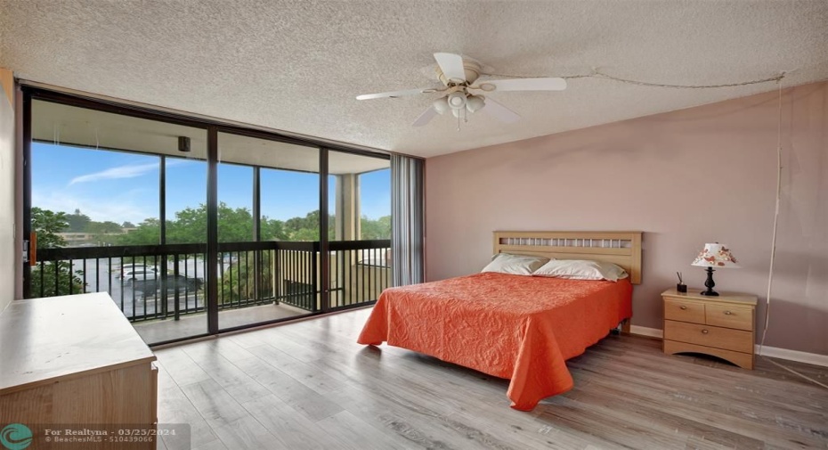 Primary Bedroom with Screened In Patio