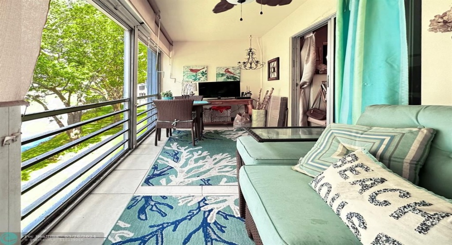 3rd Floor Screened Patio w/Roll Down Shades for Florida Living