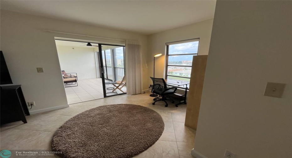 Desk for you to do your work/pay bills while overlooking beautiful view. Entrance into private balcony from master