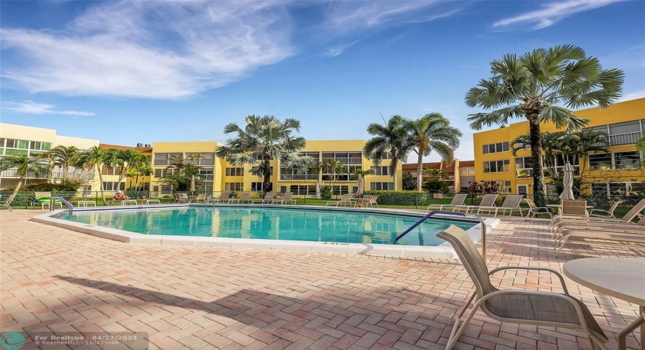 Rarely Available Corner Unit - Spacious 2 Bedroom 2 Bath Condo is Turn Key Move-In Ready. Located in one of the most desirable serene 55+ Communities of Margate. The unit features an Amazing View, Updated Custom Kitchen, Quartz Counters, Stainless Steel Appliances, Plantation Shutters, Impact Glass with lots of Natural Light, Screened Lanai with a view of gorgeous gardens & pool.