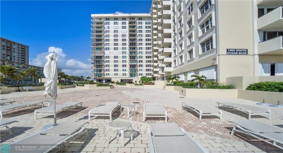 View of freshly painted building from pool deck