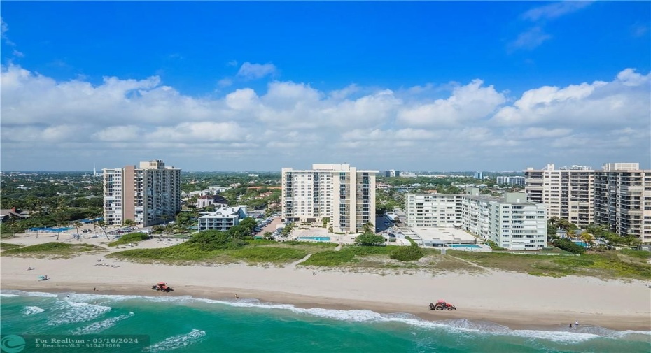 Ocean Place in the middle - cleaning beach