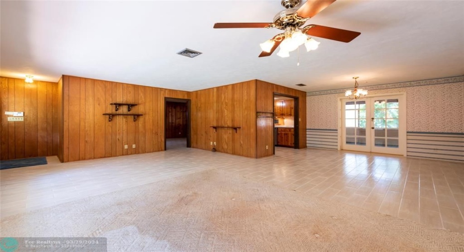 L shaped dining rm to Living rm and foyer entry