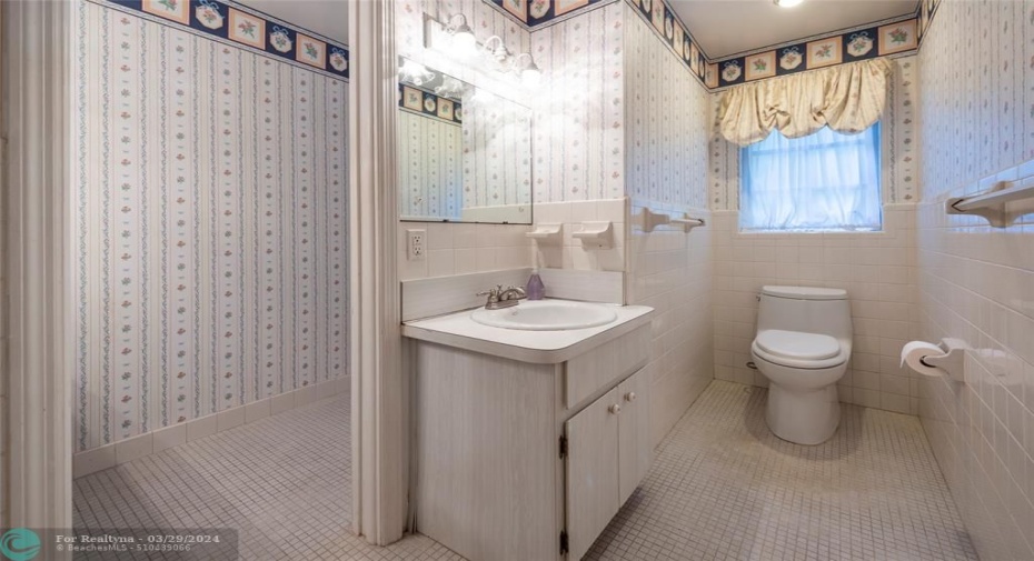 Split Bath with toilet and sink in one side....