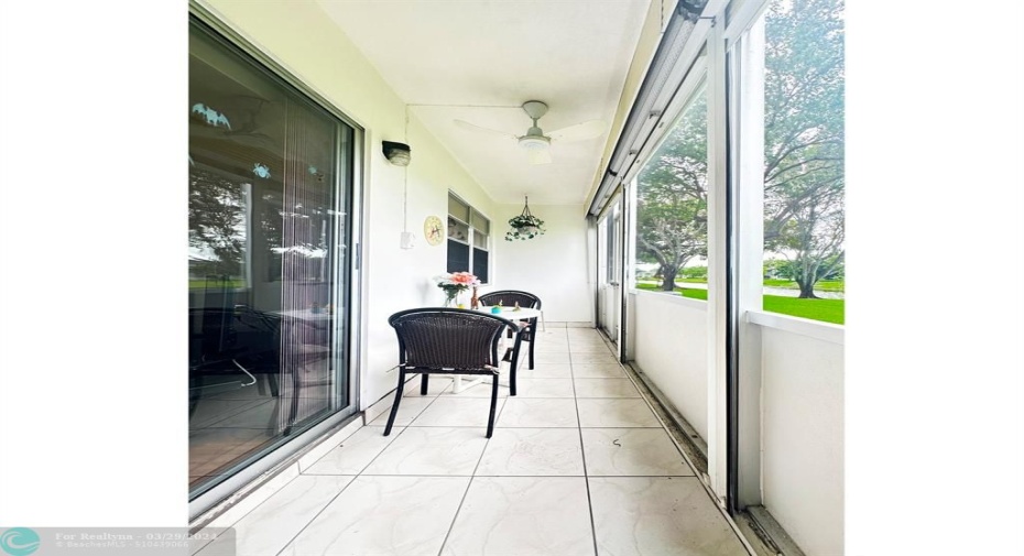 Screen Enclosed Patio w/Tile Floor & Ceiling Fan