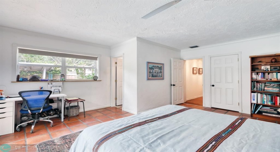 Pimary bedroom with alcove and desk