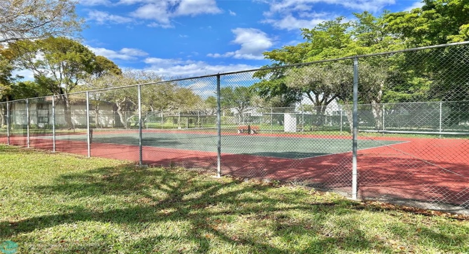 Walk to neighborhood tennis court.