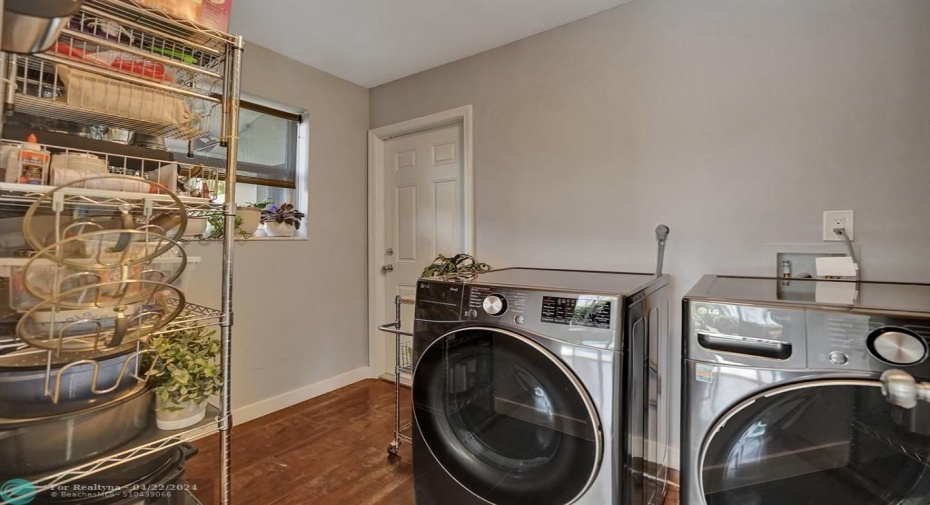LG Washer & Dryer conveniently located in the laundry room inside the house.