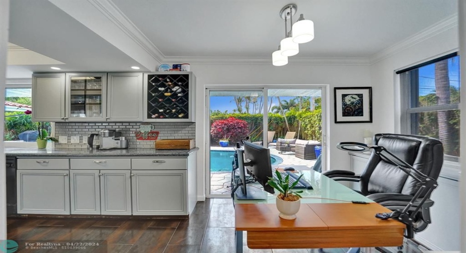 The kitchen is large enough that the sellers are using part of it as an office but you can have a table.