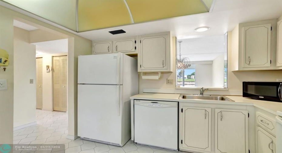 LARGE KITCHEN CAN BE OPENED TO LIVING ROOM.