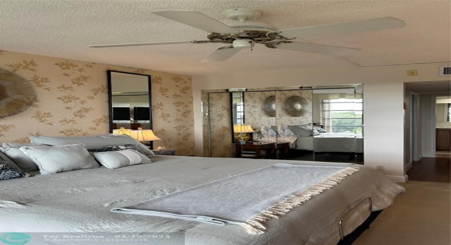 The spacious master features a walk-in closet and two additional closets for added space and storage.