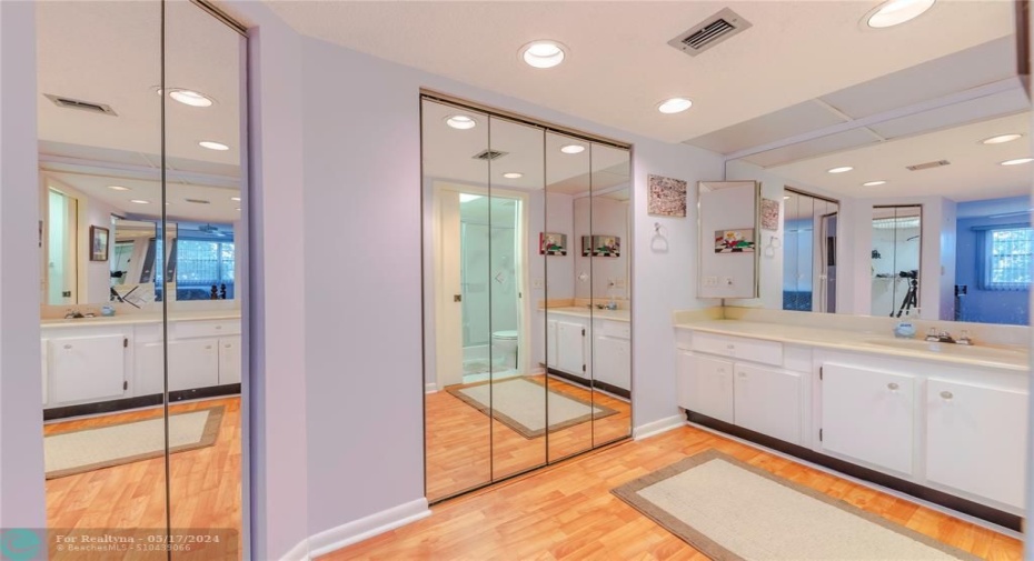 oversized main bathroom with loads of closets