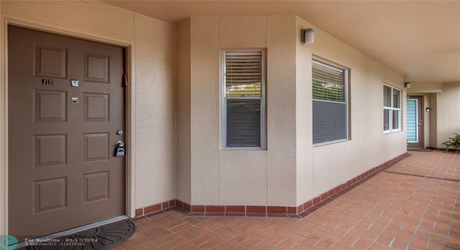entrance right next to stairs the parking space