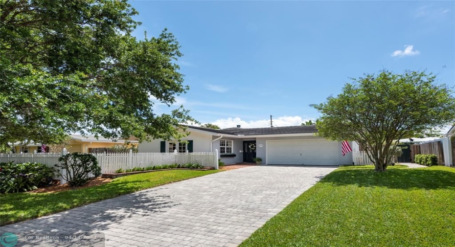 Spacious driveway & two car garage
