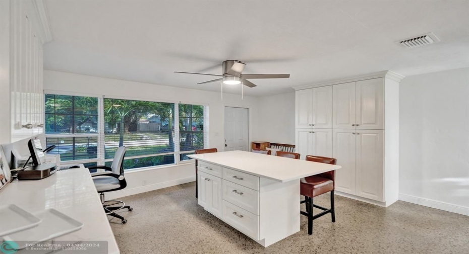 Extended Kitchen and Island Dining w/Built Ins offering extra storage