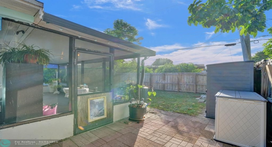 Doggie Door from Porch with fully fenced yard