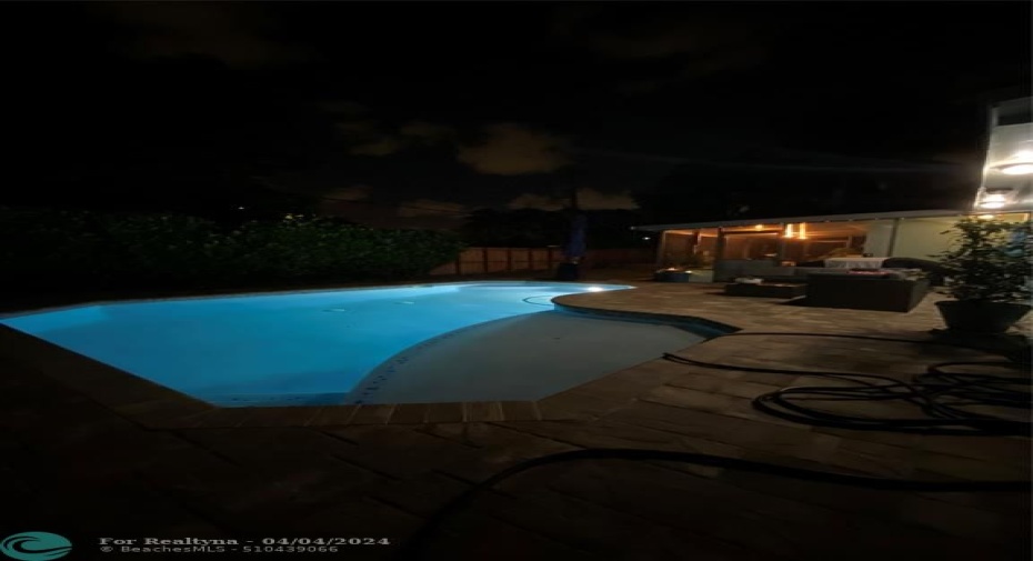 Salt Water Pool and Sunshelf at night lit up