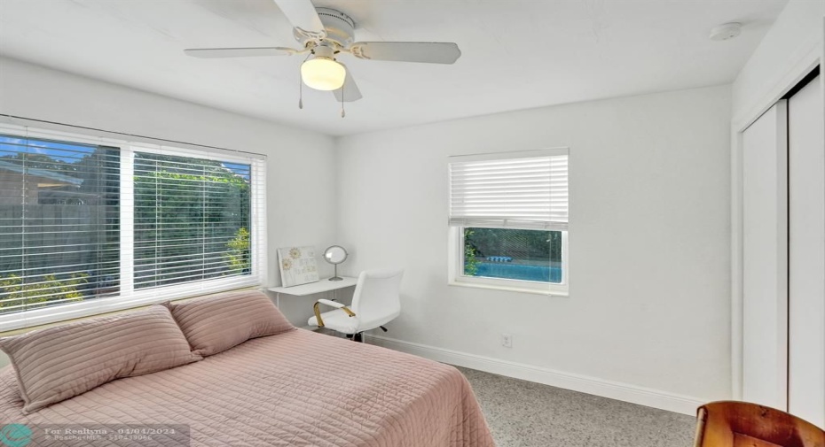 Bedroom 2 with Pool View and South Side Facing window (garden area)