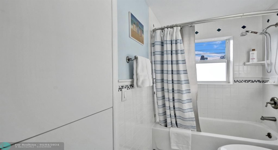Full Bathroom with Pool View. Added Closet for extra storage when we corrected the Air Conditioning Unit as it was replaced.
