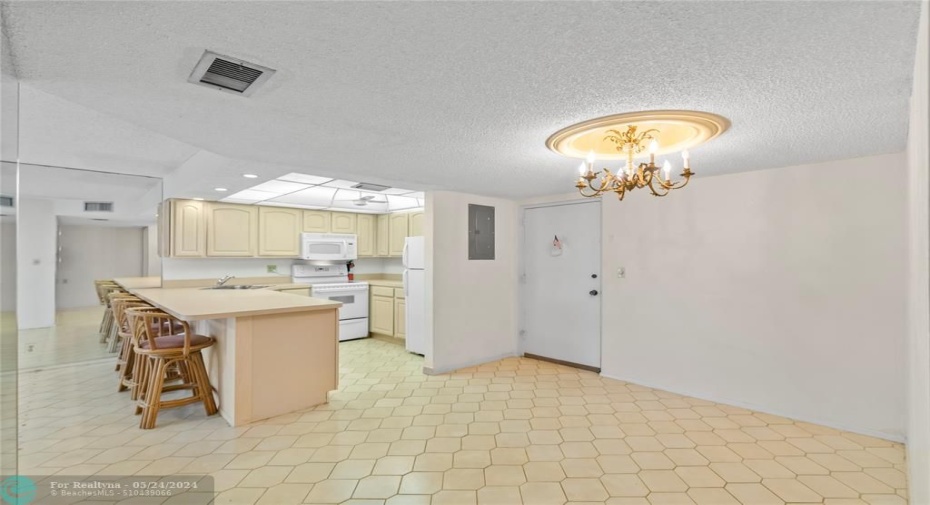 View from dining area looking into kitchen