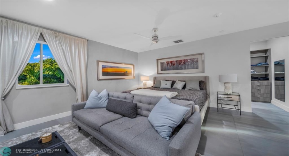 This is a true Primary suite with king size bed, extra sitting area and room to walk out to the terrace.