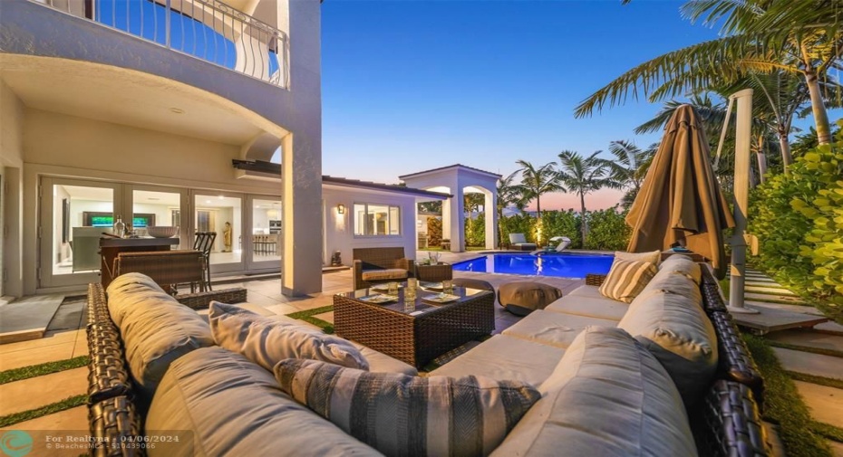 You just don't want to go back inside with this cozy pool paradise!