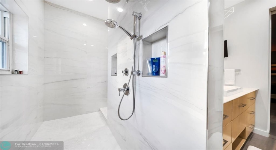 Primary suite bathroom, has a luxury spa feel.