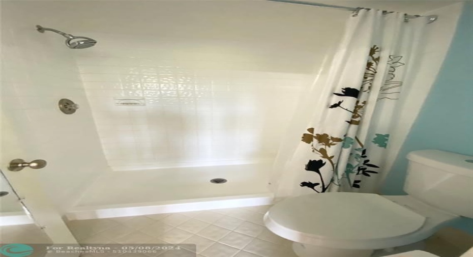 Walk-in shower in master bathroom.