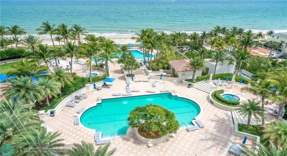 Tropical pool area..note...one pool is under construction