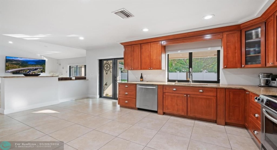 Solid wood cabinetry with granite counter tops.