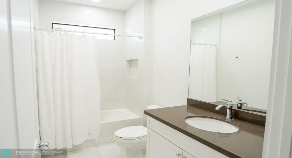 Full Bath Between Bedroom Two & Three.