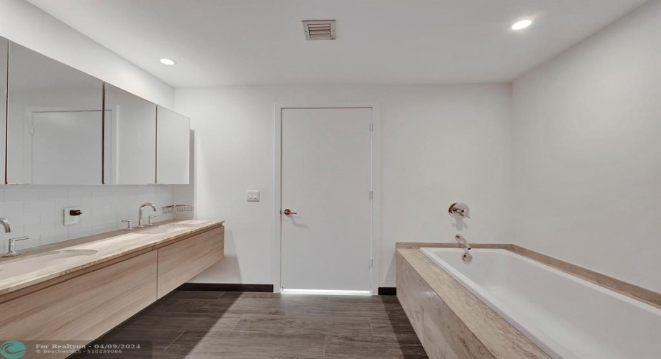 Master bath with separate bathtub