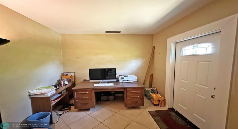 Office with exterior door.