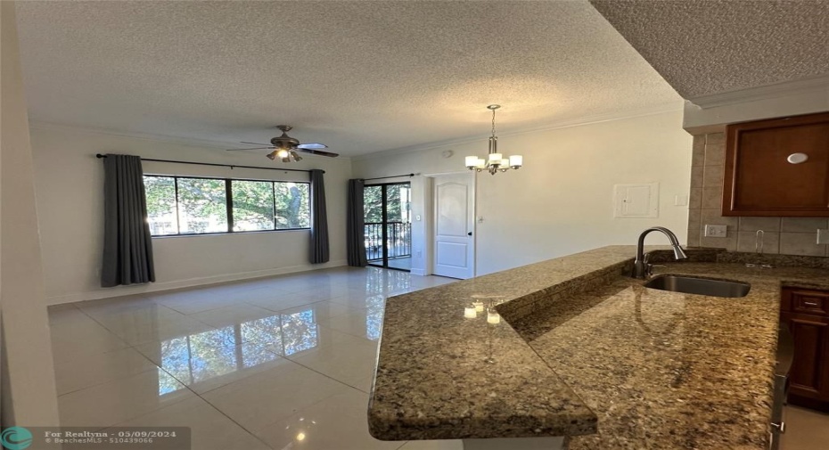 View of family & dining areas from the foyer