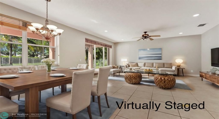 Family room & breakfast area virtually staged to help envision the space