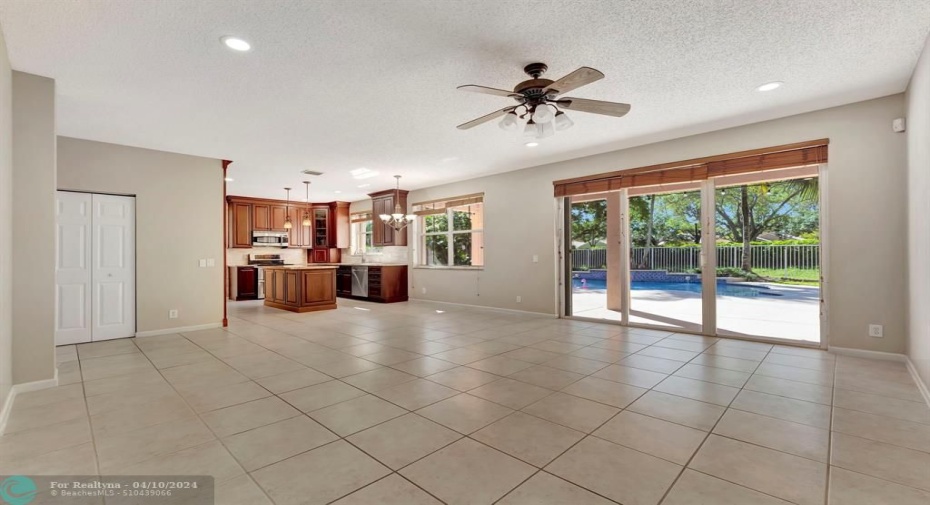 Spacious family room that opens out to the tropical pool area