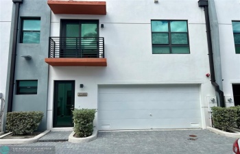 Front entrance with two car garage.