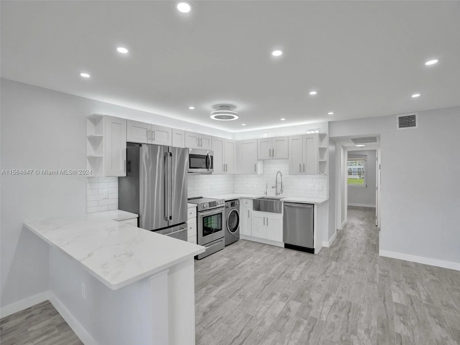 Quartz Countertops. ALL new Appliances and tons of storage.