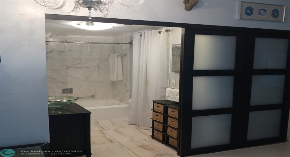 Bathroom with Japonese Glass sliding entry doors...