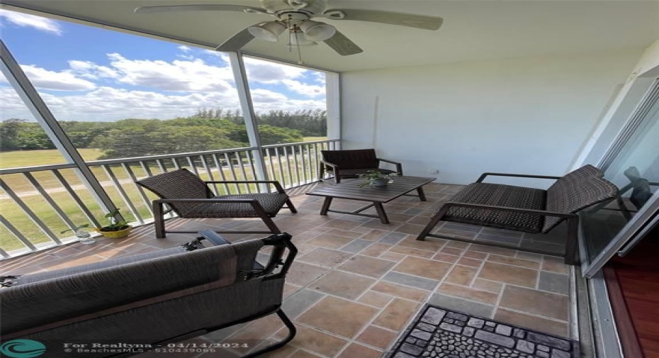 serene, stunning view from generous size screened in balcony