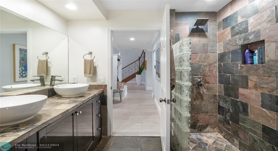 Full 3nd bathroom downstairs to the pool