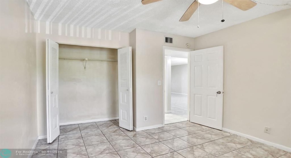 SECOND BEDROOM 11'11