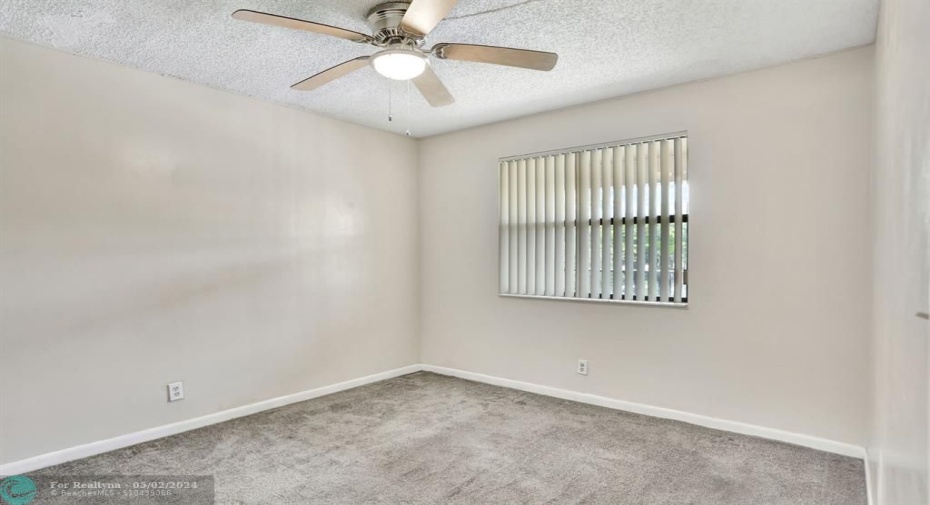 SECOND BEDROOM:  11'11