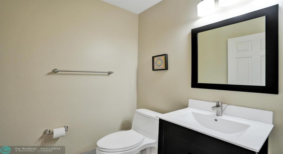 Renovated powder room.